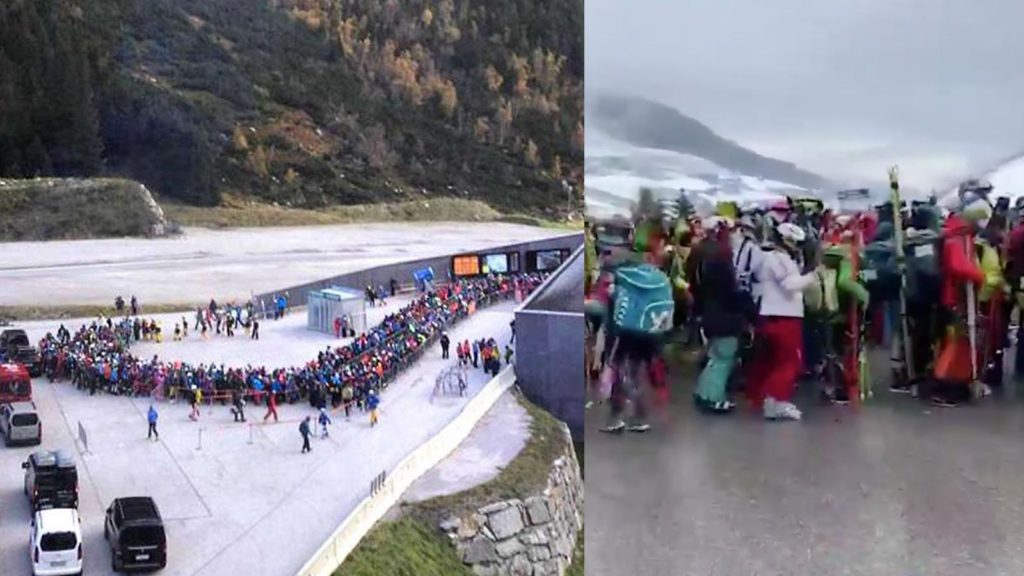 Leute stehen in Tirol dichtgedrängt vor dem Skilift
