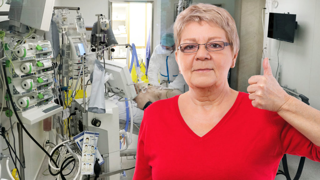 Patientin zeigt ihre Zustimmung auf der Intensivstation mittels einer Daumen-nach-oben-Geste