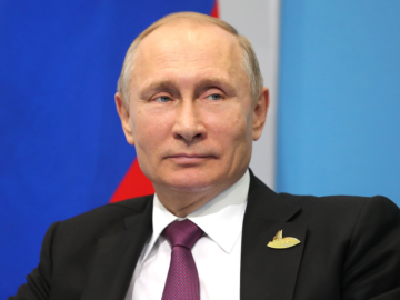 Putin lächelt