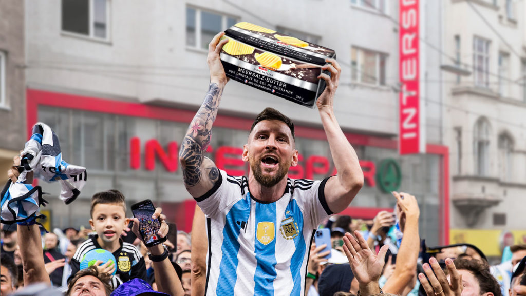 Messi stemmt eine Premium-Butter in die Höhe