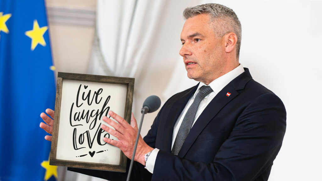 Nehammer hält einen Bilderrahmen. Schrift auf Bilderrahmen: "Live, Laugh, Love".
