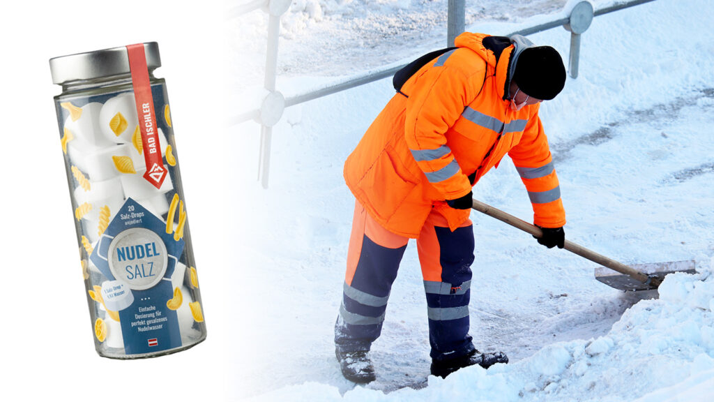 Bad Ischler Nudelsalz, daneben ein Arbeiter, der Schnee räumt