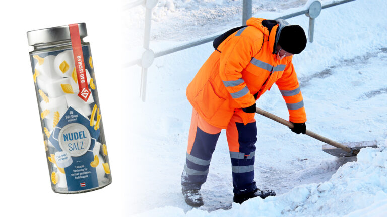 Bad Ischler Nudelsalz, daneben ein Arbeiter, der Schnee räumt