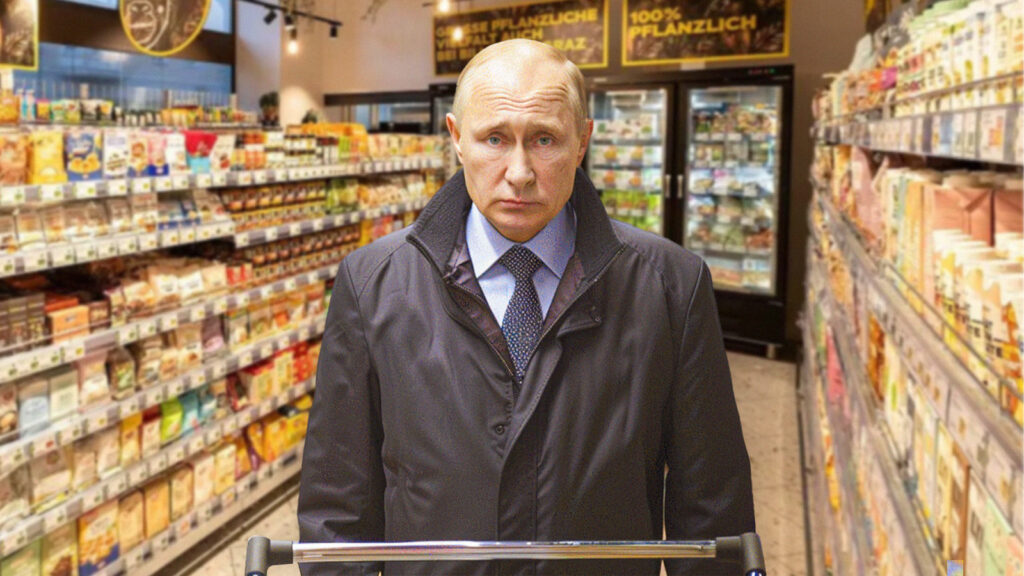 Putin steht mit Einkaufswagen im BIlla