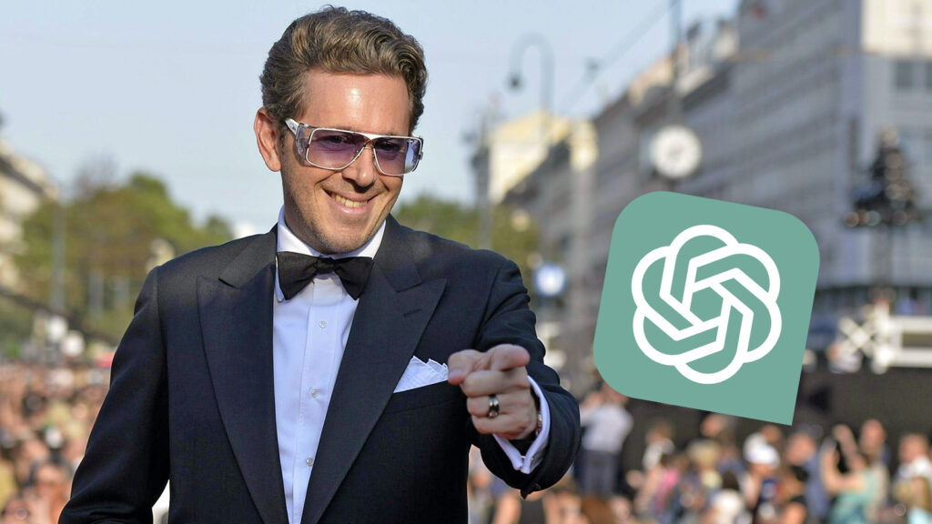 Das Bild zeigt Harald Mahrer, der im Anzug und mit Sonnenbrille auf das ChatGPT-Logo zeigt