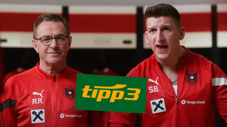 Ralf Ragnick und Satansbratan in der Kabine, daneben ein tipp3 logo.