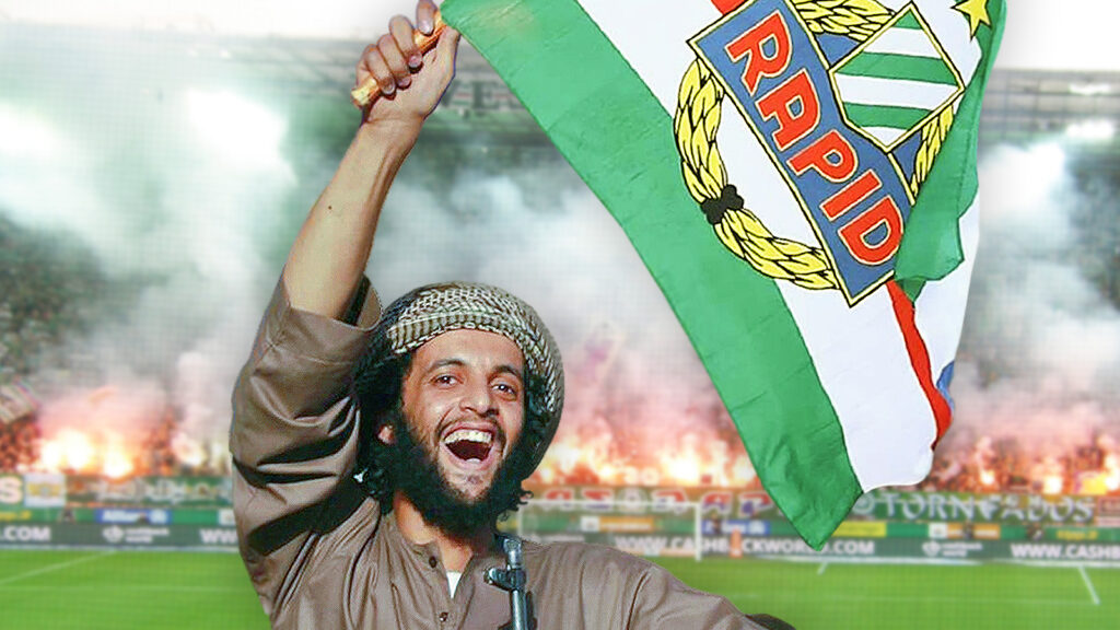 Das bild zeigt einen Islamisten, der eine Rapid Fahne schwenkt. Im Hintergrund Pyrofeuer.