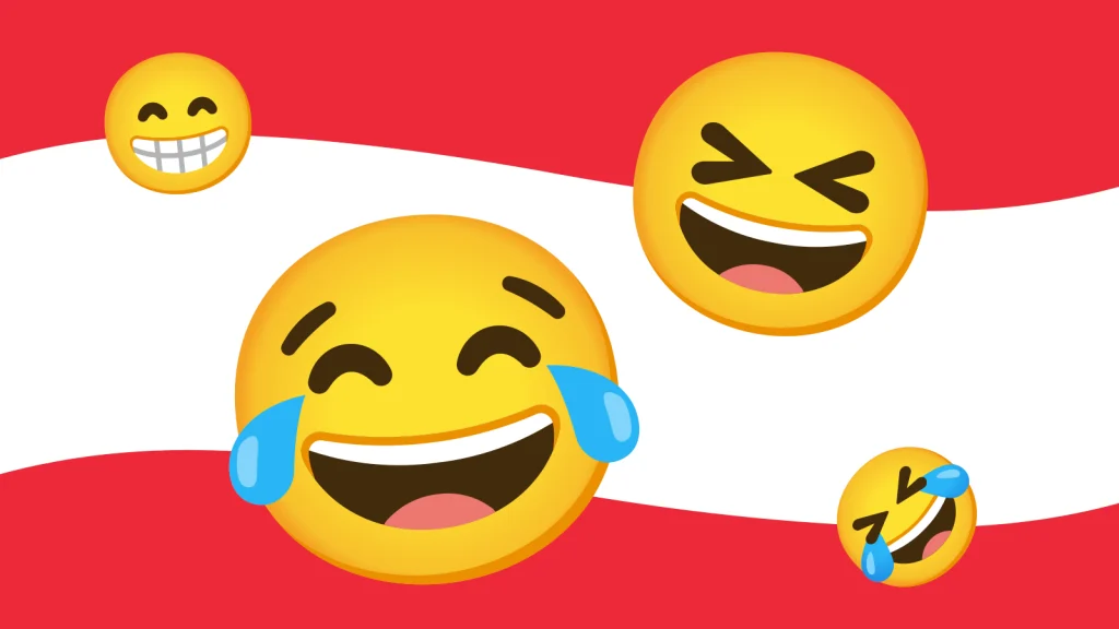 Das Bild zeigt lachende Emojis auf einer Österreich-Flagge.