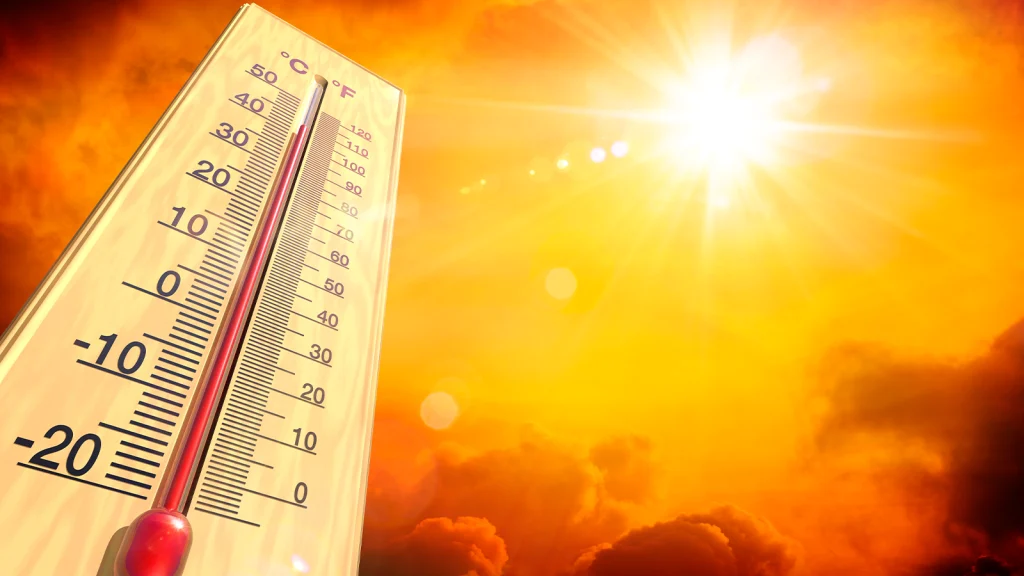 Das Bild zeigt ein Thermometer in der glühenden Sonne.